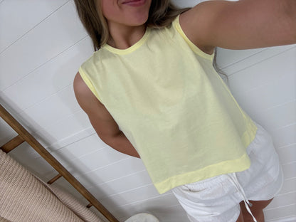 pastel yellow sleeveless tank top for women, lightweight summer top styled with white linen shorts casual cute outfit