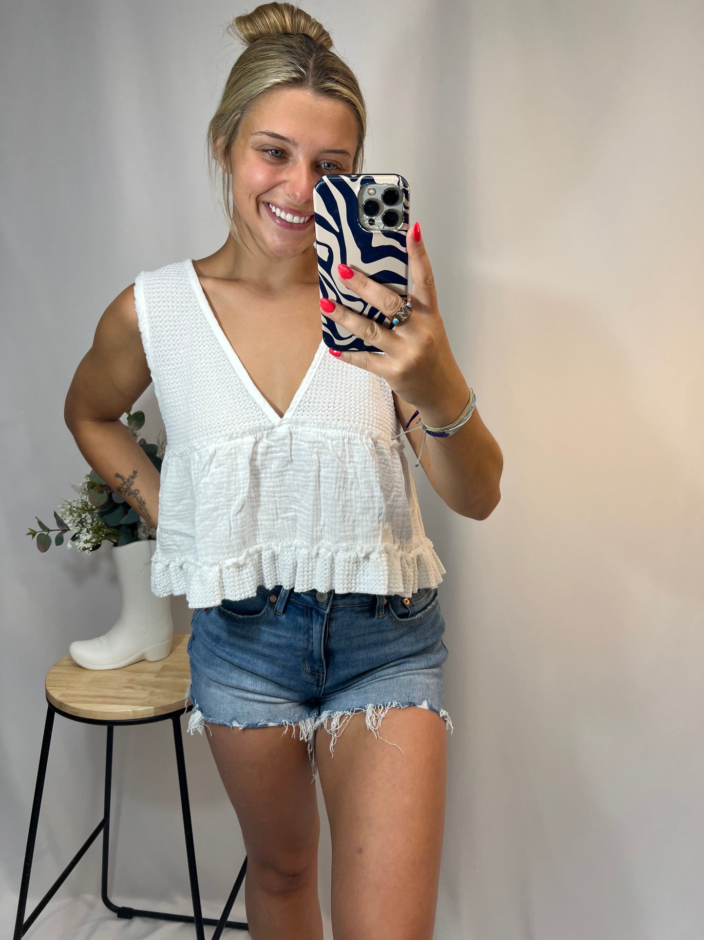 white ruffle sleeveless thermal babydoll tank, women’s cropped waffle knit top with flowy fit