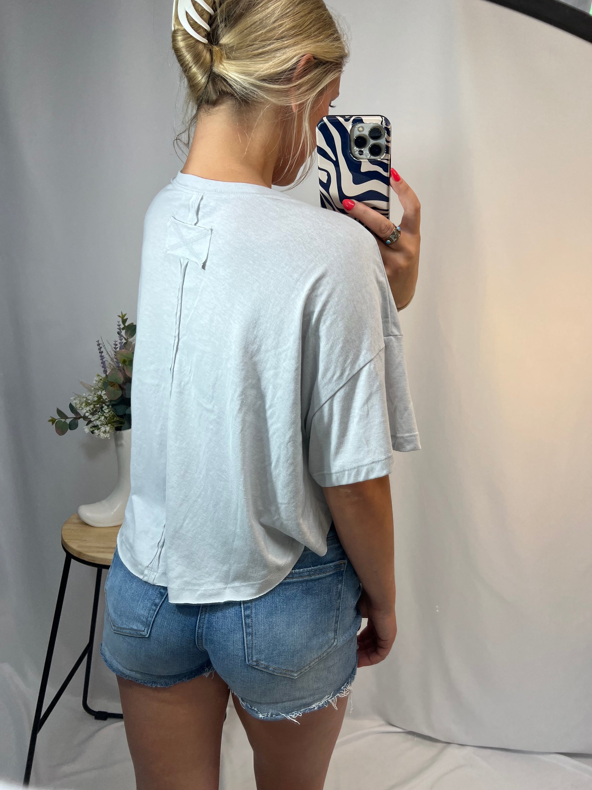 Back view of oversized casual tee, women’s relaxed fit soft cotton t-shirt