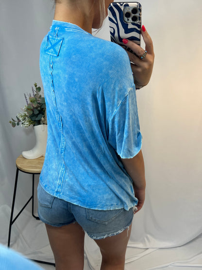 Back view of slouchy oversized tee with front pocket, women’s relaxed cotton t-shirt with pocket