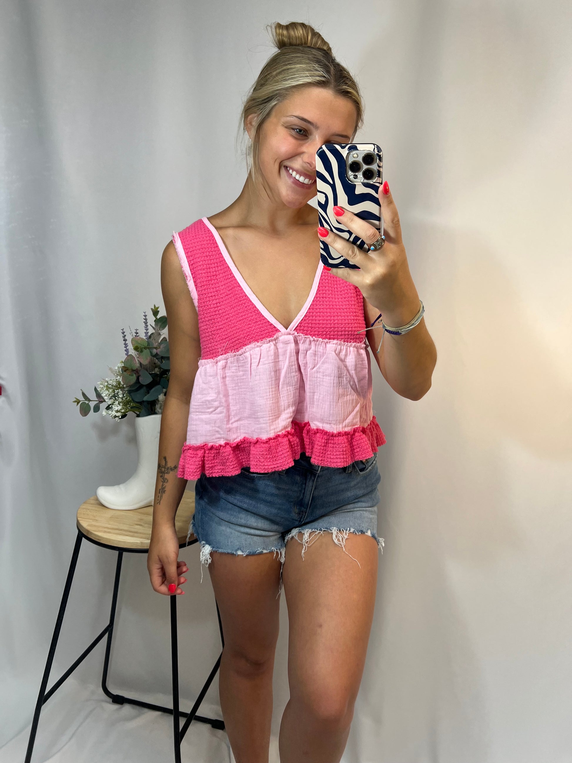 Hot pink and light pink two-tone sleeveless thermal babydoll tank, women’s cropped waffle knit top with flowy fit