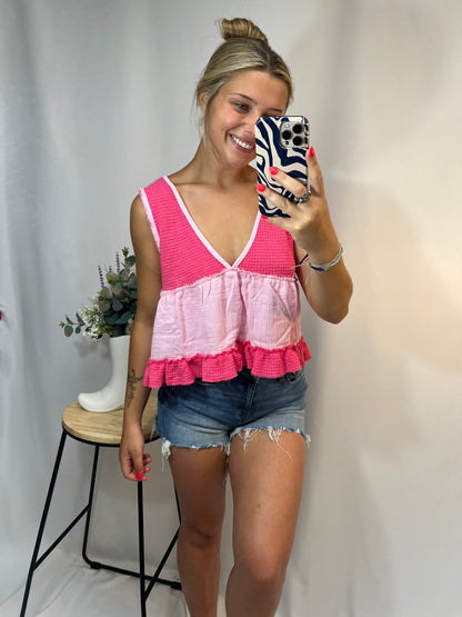Hot pink and light pink two-tone sleeveless thermal babydoll tank, women’s cropped waffle knit top with flowy fit