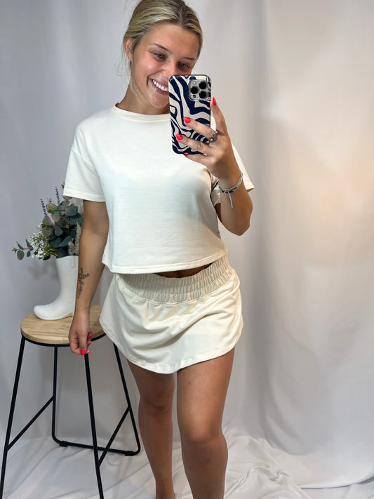 Ivory cropped tee and ruffle high-waist skort set, women’s matching top and skirt shorts outfit