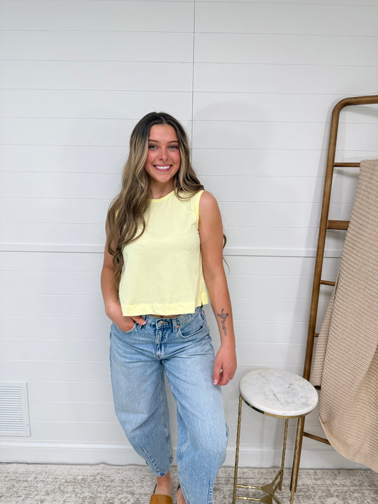 pastel yellow sleeveless tank top for women, lightweight summer top styled with denim jeans, casual cute outfit