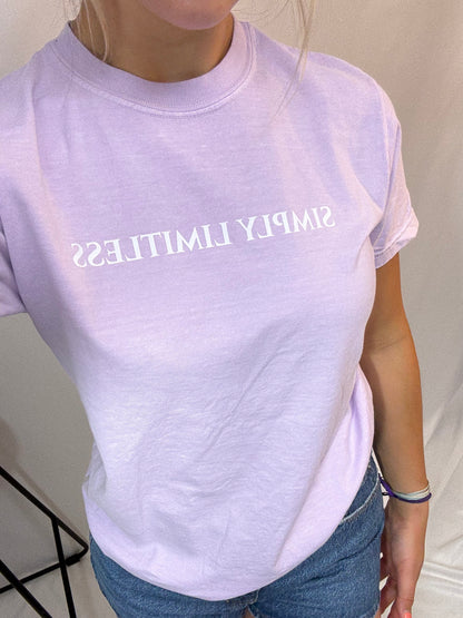 Close up orchid-colored Simply Limitless tee, soft vintage-style women’s graphic t-shirt