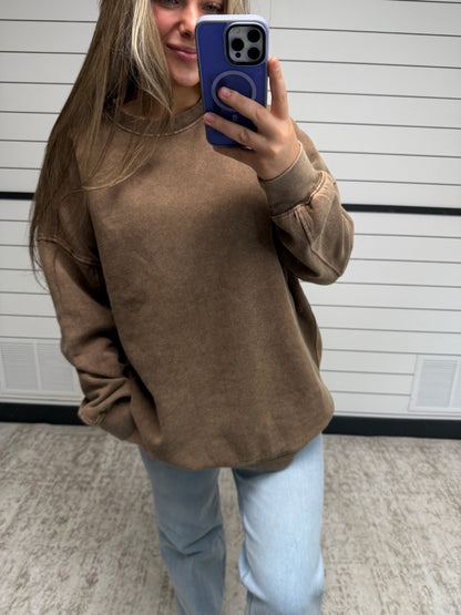 Close up of soft relaxed crewneck sweatshirt, oversized women’s pullover with crew neck