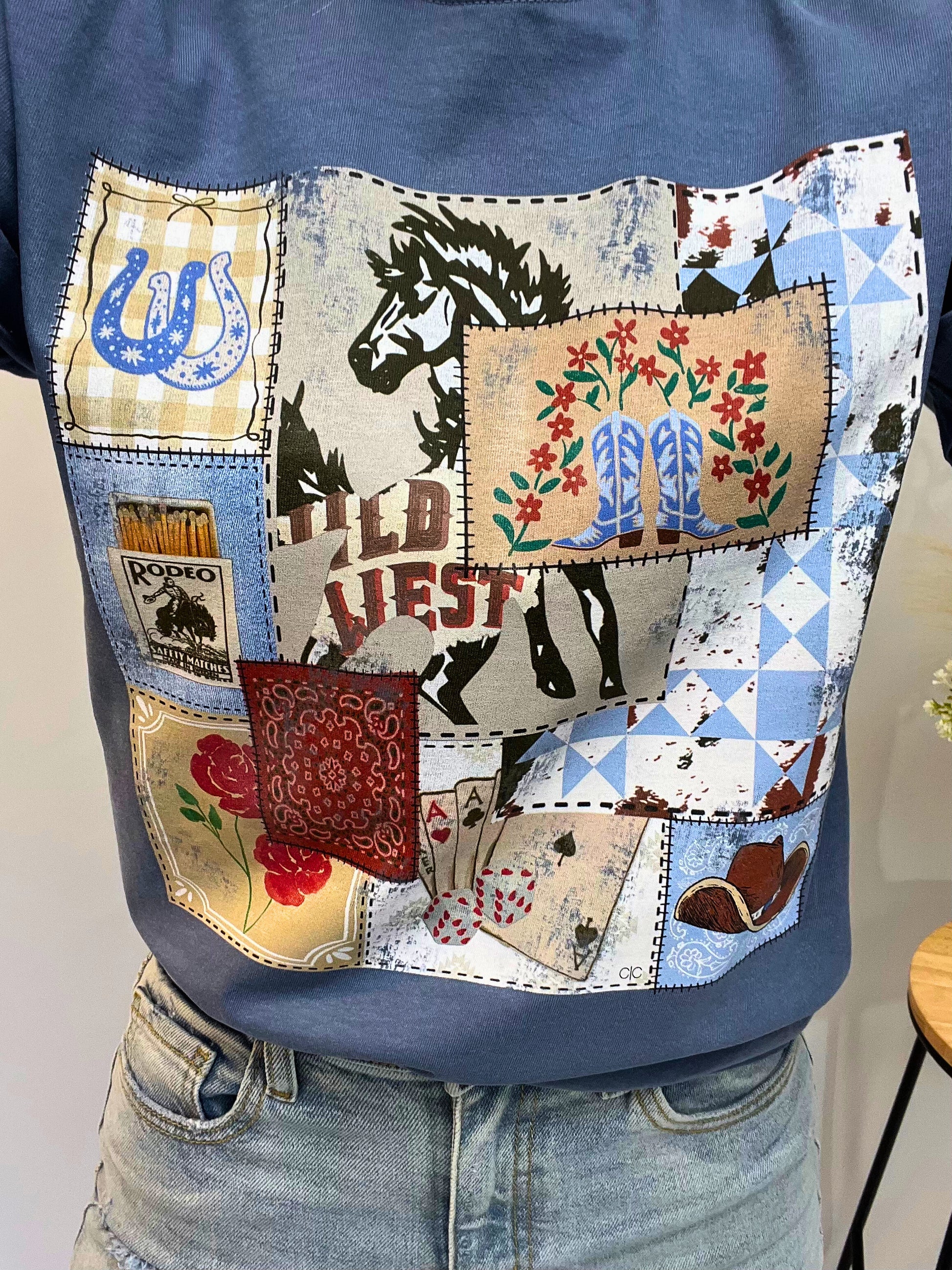Close-up of rodeo patch tee, women’s western-style t-shirt with embroidered rodeo patch on chest