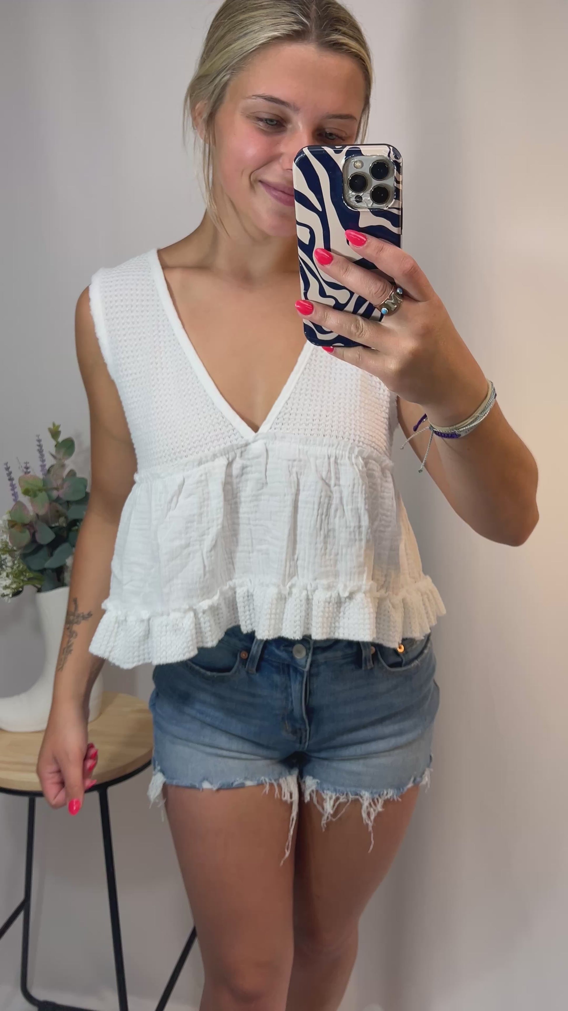 White sleeveless thermal babydoll tank, women’s cropped waffle knit top with flowy fit