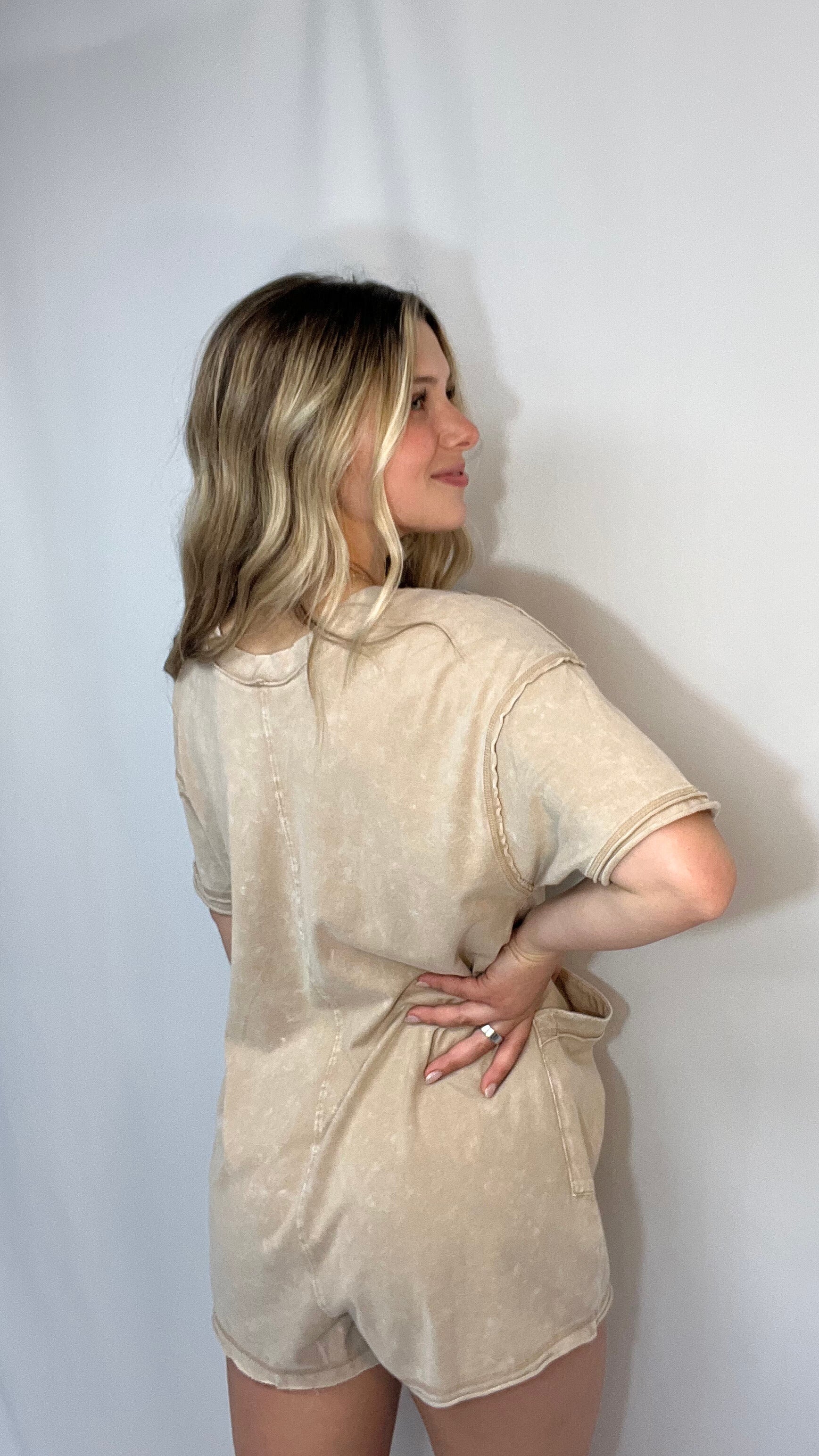 Back view of taupe mineral washed oversized romper, women’s casual one-piece lounge romper in soft washed fabric